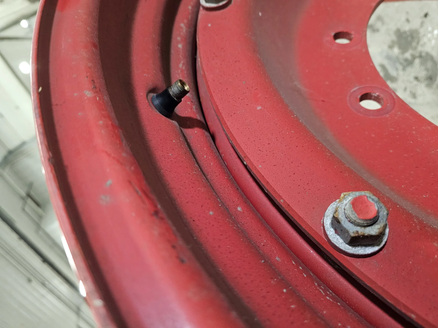 Used 14 X 34 Fendt Red 12 Bolt Waffle Wheel Assembly (12-16.625-14.625) - Good Condition  
(Scratche image 4