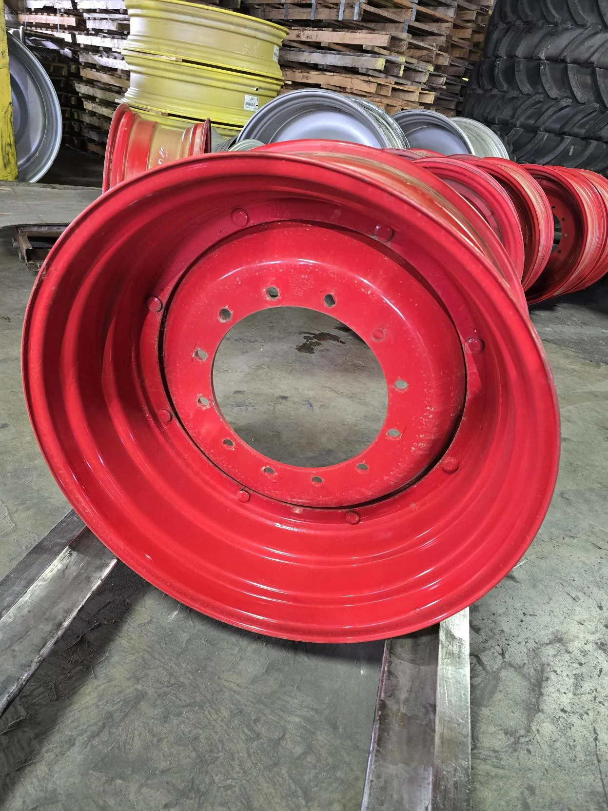 Used 14 X 34 Fendt Red 12 Bolt Waffle Wheel Assembly (12-16.625-14.625) - Good Condition  
(Scratche image 6