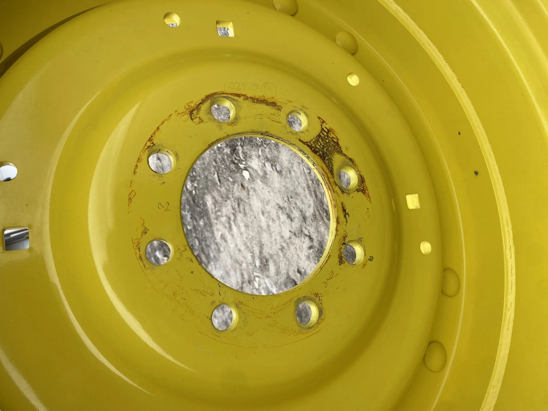 Used 15 X 30 John Deere Yellow Waffle Wheel (2 Bolt) (24-23.25) 9.5" BS with a 28/30" John Deere Yel image 3