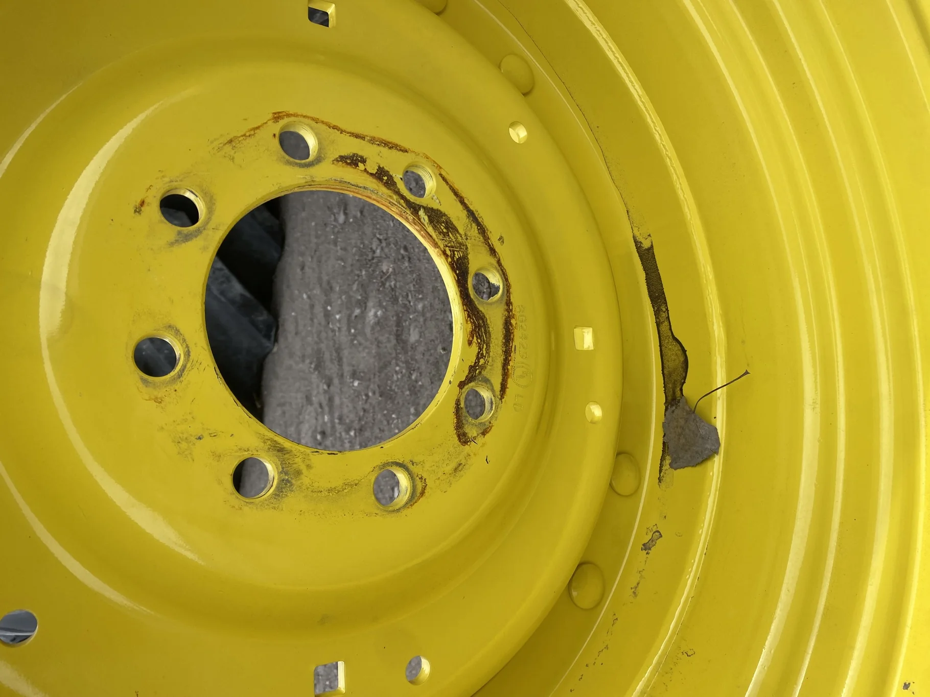 Used 15 X 30 John Deere Yellow Waffle Wheel (2 Bolt) (24-23.25) 9.5" BS with a 28/30" John Deere Yel image 4