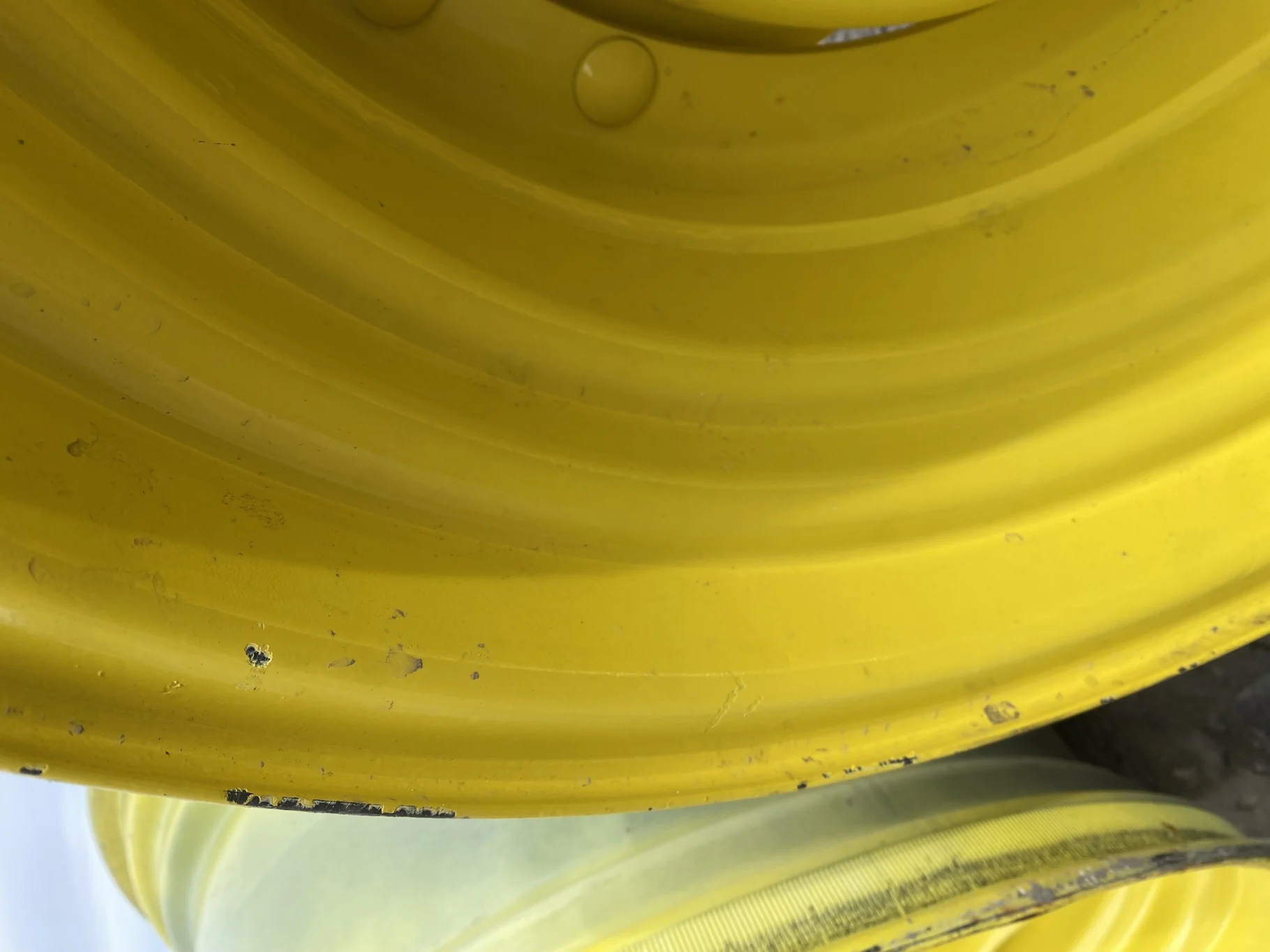 Used 15 X 30 John Deere Yellow Waffle Wheel (2 Bolt) (24-23.25) 9.5" BS with a 28/30" John Deere Yel image 7