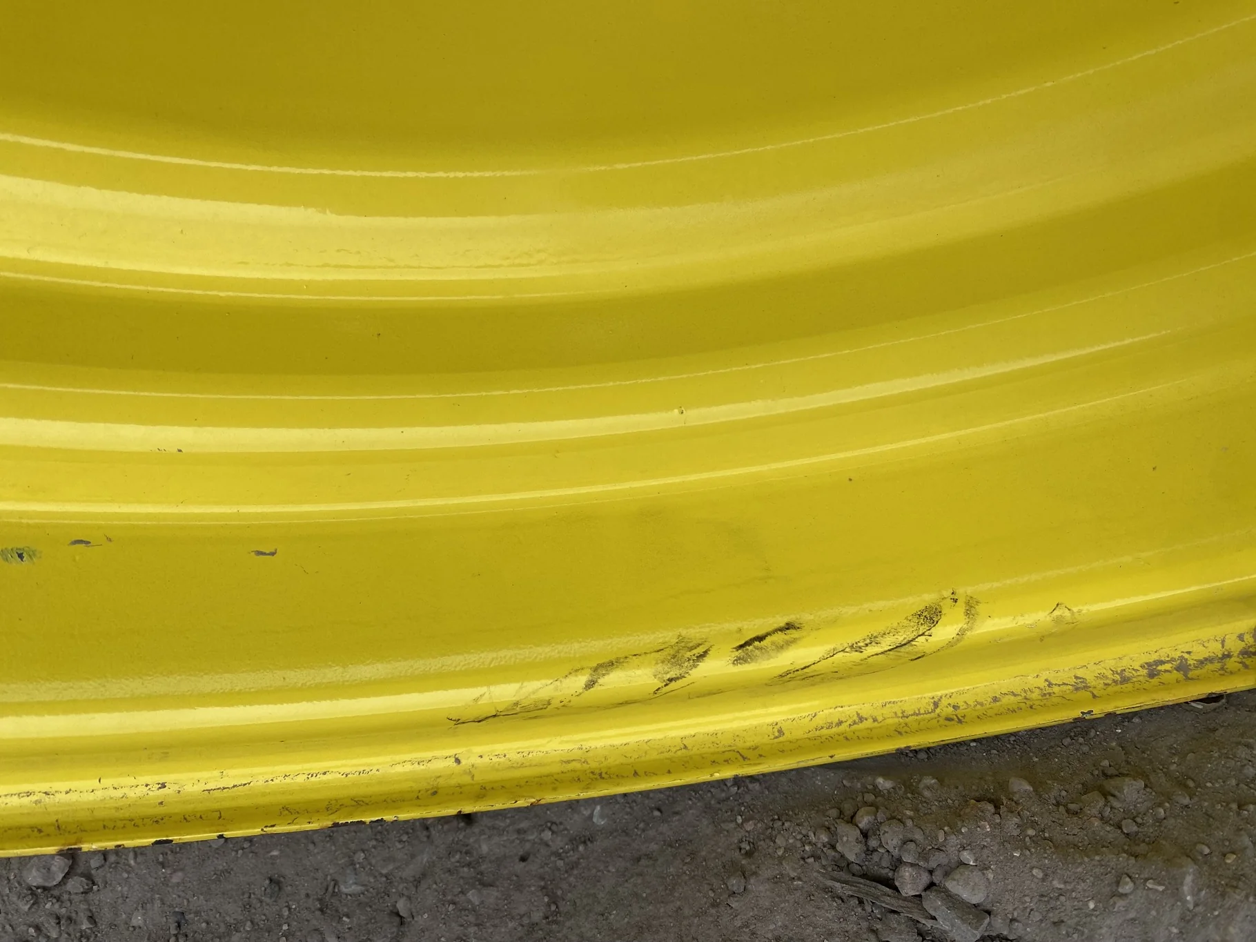 Used 15 X 30 John Deere Yellow Waffle Wheel (2 Bolt) (24-23.25) 9.5" BS with a 28/30" John Deere Yel image 8