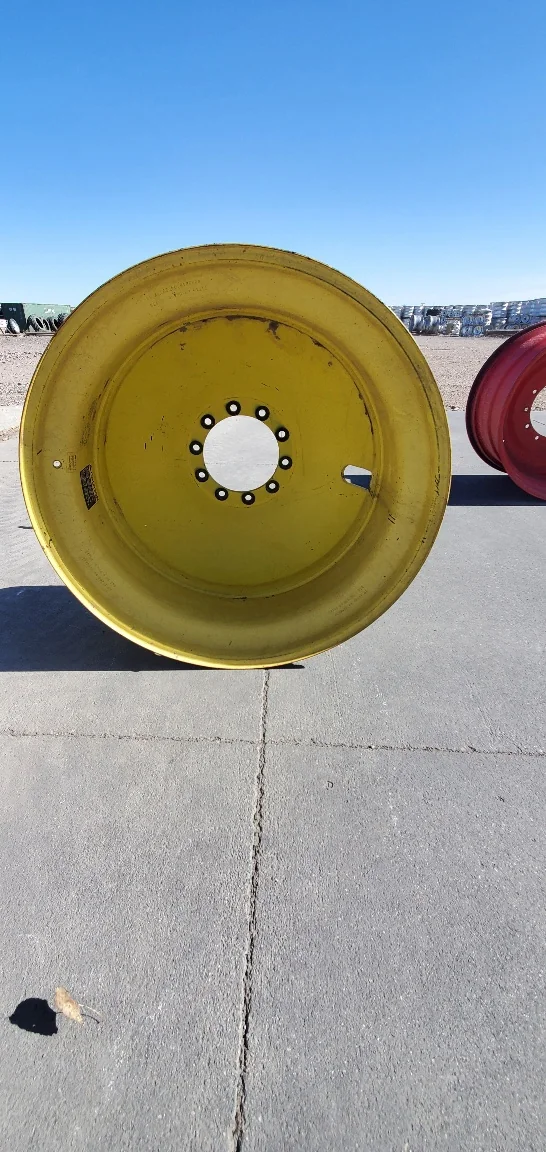 Used 16 X 42 John Deere Yellow 10 Bolt (23mm) Dolly Dual (10-13.187)