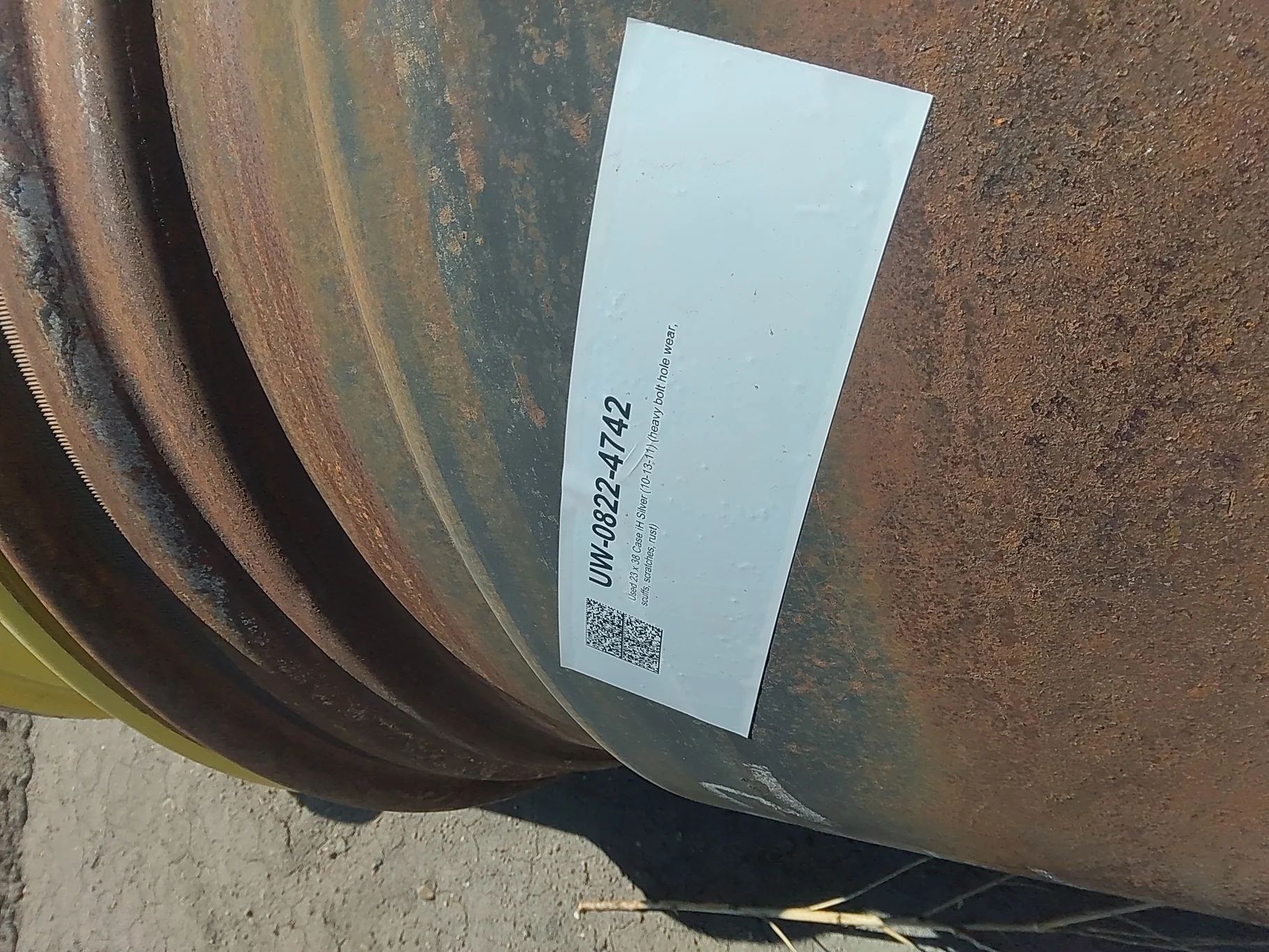 Used 23 x 38 Case iH Silver (10-13-11) (heavy bolt hole wear, scuffs, scratches, rust)