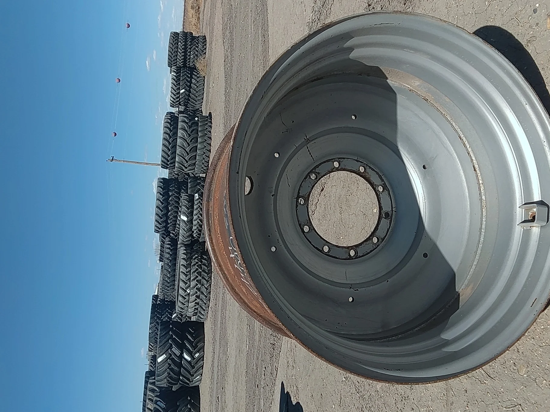 Used 23 x 38 Case iH Silver (10-13-11) (heavy bolt hole wear, scuffs, scratches, rust) image 4