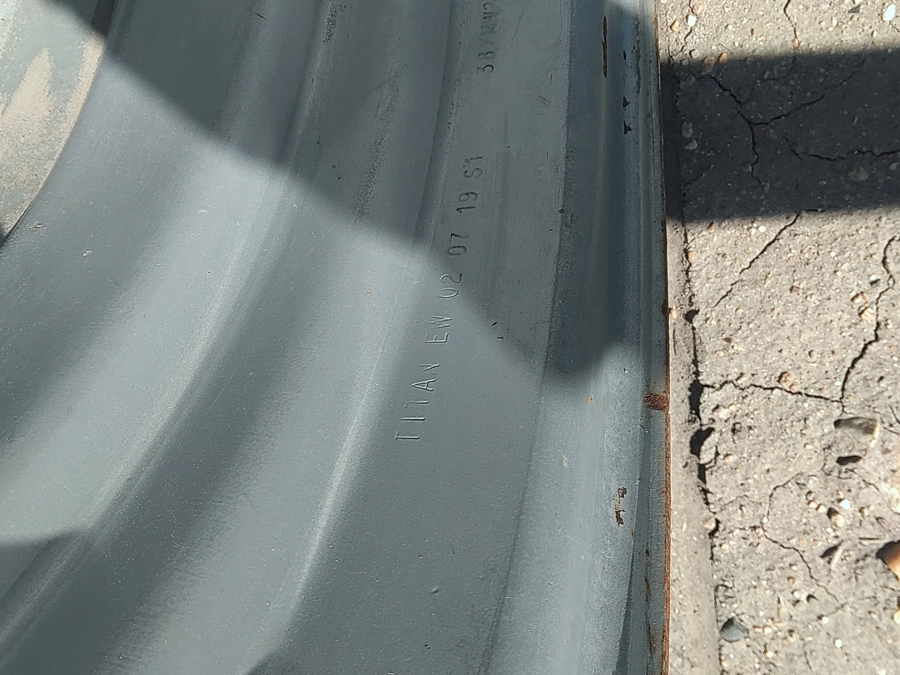 Used 23 x 38 Case iH Silver (10-13-11) (heavy bolt hole wear, scuffs, scratches, rust) image 5