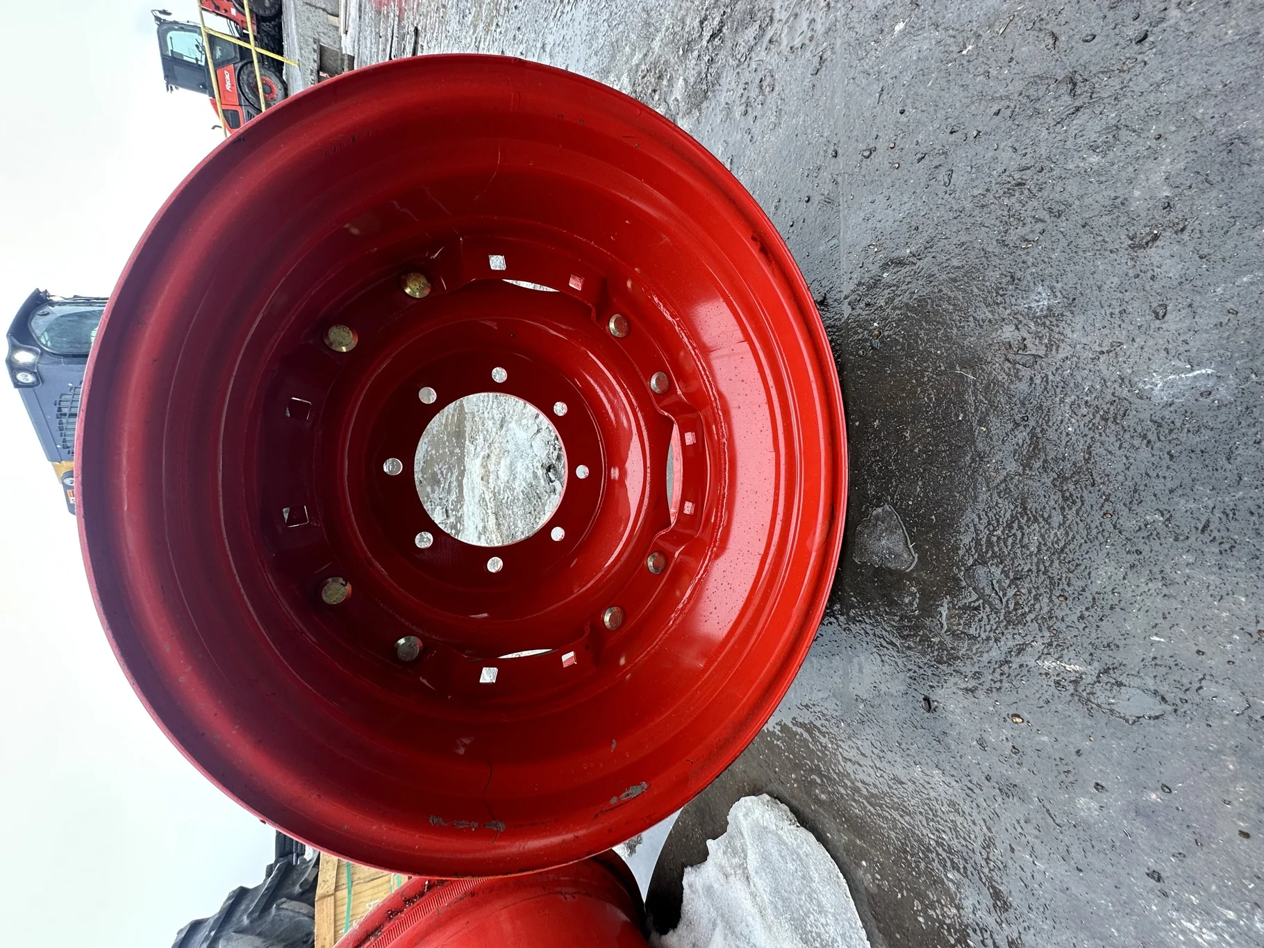 Used 12 X 24 2 Bolt Fendt Red waffle wheel with 8 bolt center (8-10.75-8.625) Scratches, Scuffs.