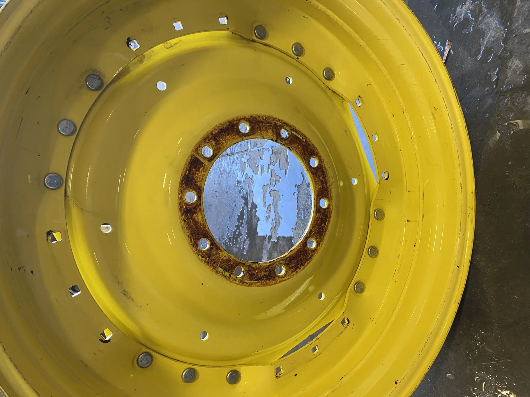 Used 10 X 42 John Deere Yellow Waffle Wheel (3 Bolt) (Faded Paint with Scratches) - Fair Condition