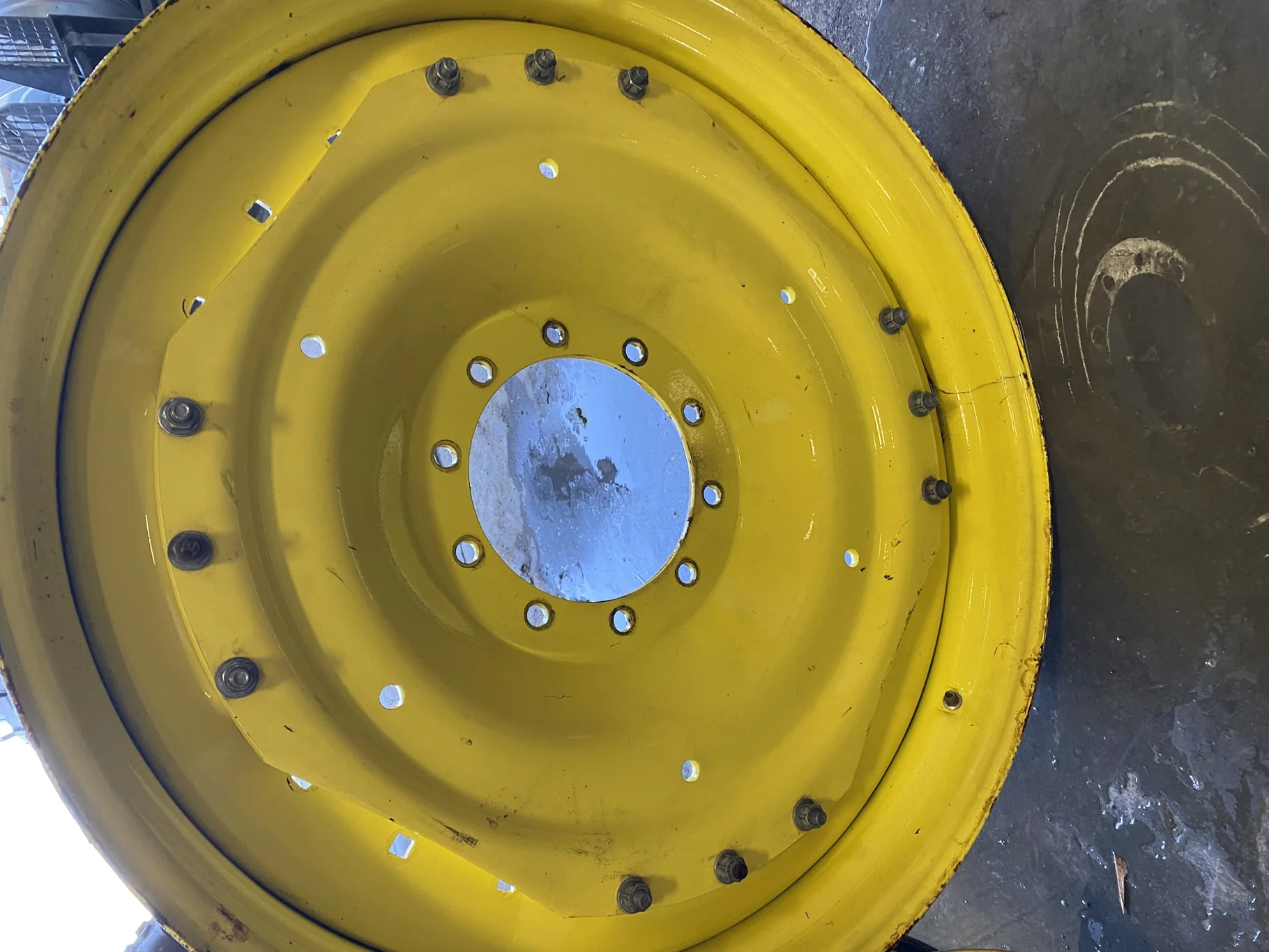 Used 10 X 42 John Deere Yellow Waffle Wheel (3 Bolt) (Faded Paint with Scratches) - Fair Condition image 2