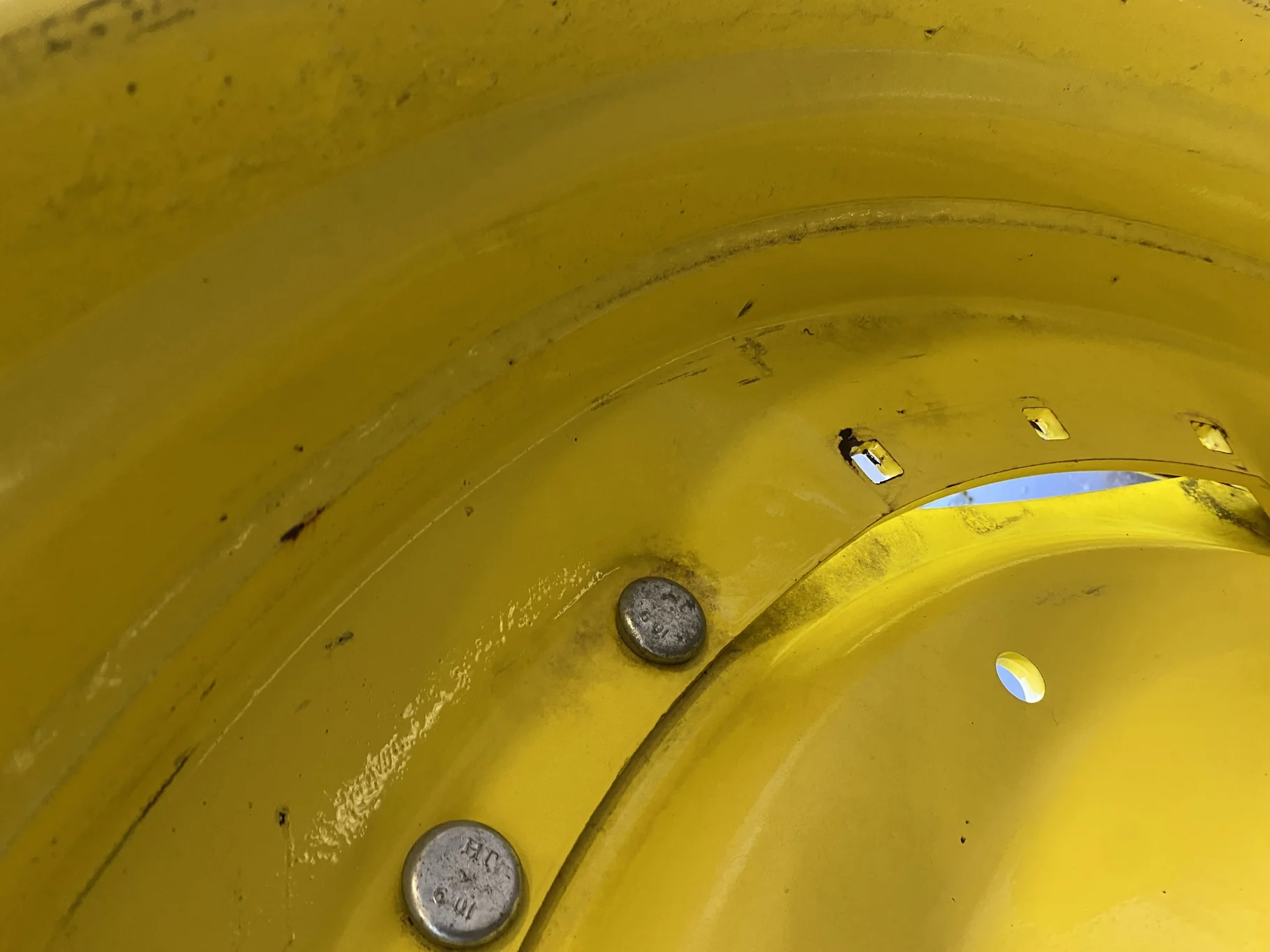 Used 10 X 42 John Deere Yellow Waffle Wheel (3 Bolt) (Faded Paint with Scratches) - Fair Condition image 3
