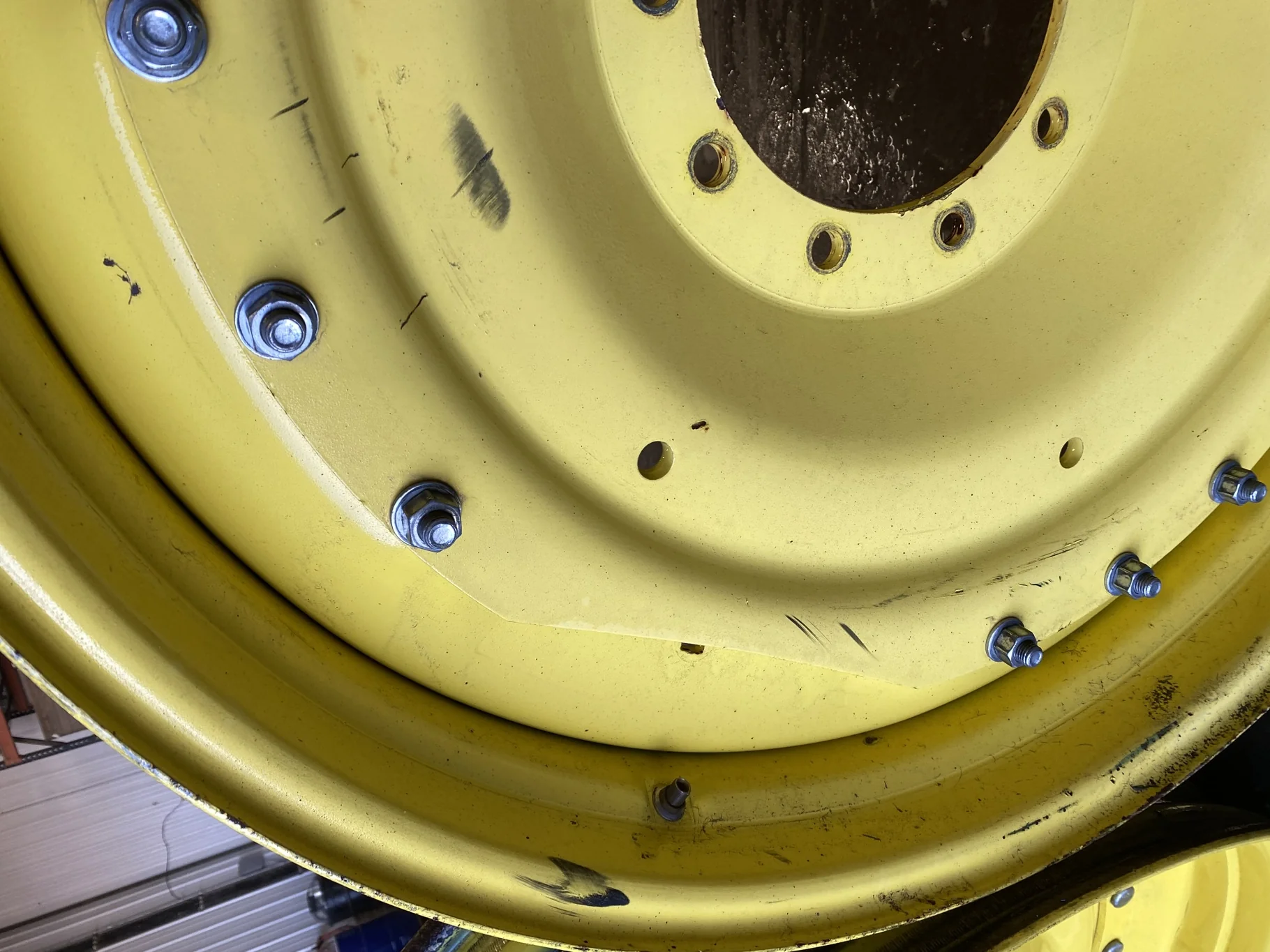 Used 10 X 42 John Deere Yellow Waffle Wheel (3 Bolt) (Faded Paint with Scratches) - Fair Condition image 6