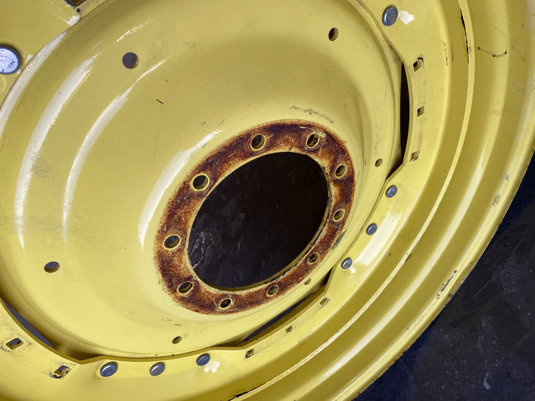 Used 10 X 42 John Deere Yellow Waffle Wheel (3 Bolt) (Faded Paint with Scratches) - Fair Condition image 7