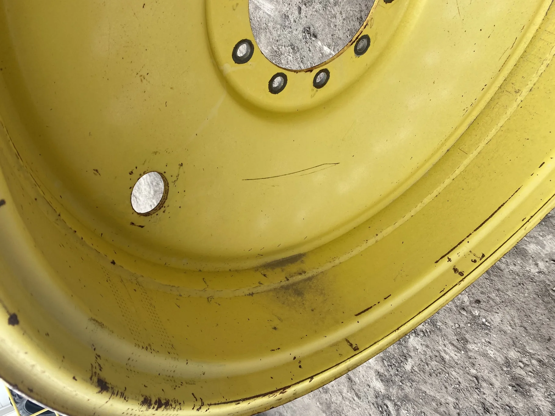 Used 16 X 42 John Deere Yellow 10 Bolt Dual Wheel (10-13.189-11.09) 6.38 IN - Fair Condition (Faded