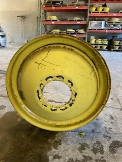 USED 16 x 42 10-13.187-11.07-14.4 (INSIDE) DOLLY DUAL YELLOW WHEEL