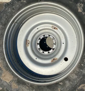 Used 15 X 50 Case IH Silver 10 Bolt (.938) Dual Wheel (10-13.189-11.07) 8.63" inset - Bent Rim (Flat