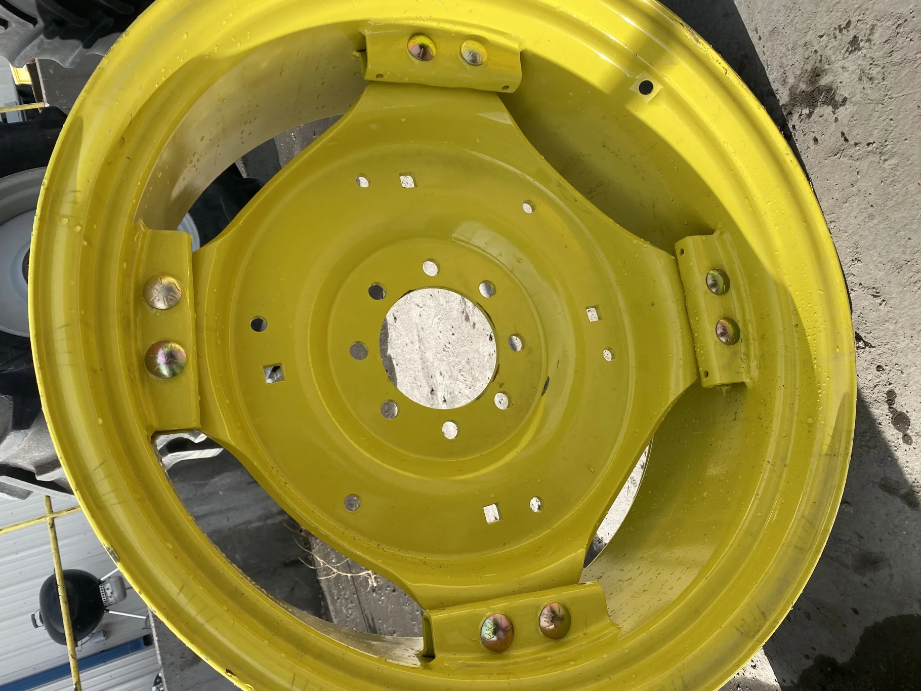 Used 12 X 28 John Deere GKN Waffle Wheel (8-8-6) center. Scratches, scuffs, rust. image 3