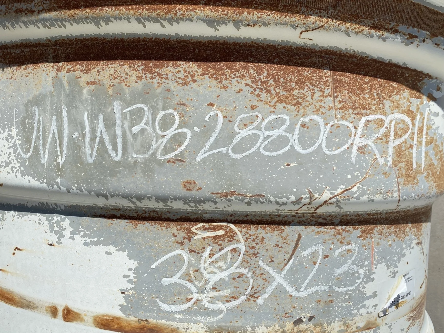 Used 23 X 38 NH White 12 bolt wheel. (12-16.25-14.625) (Rust; Gashes) image 8