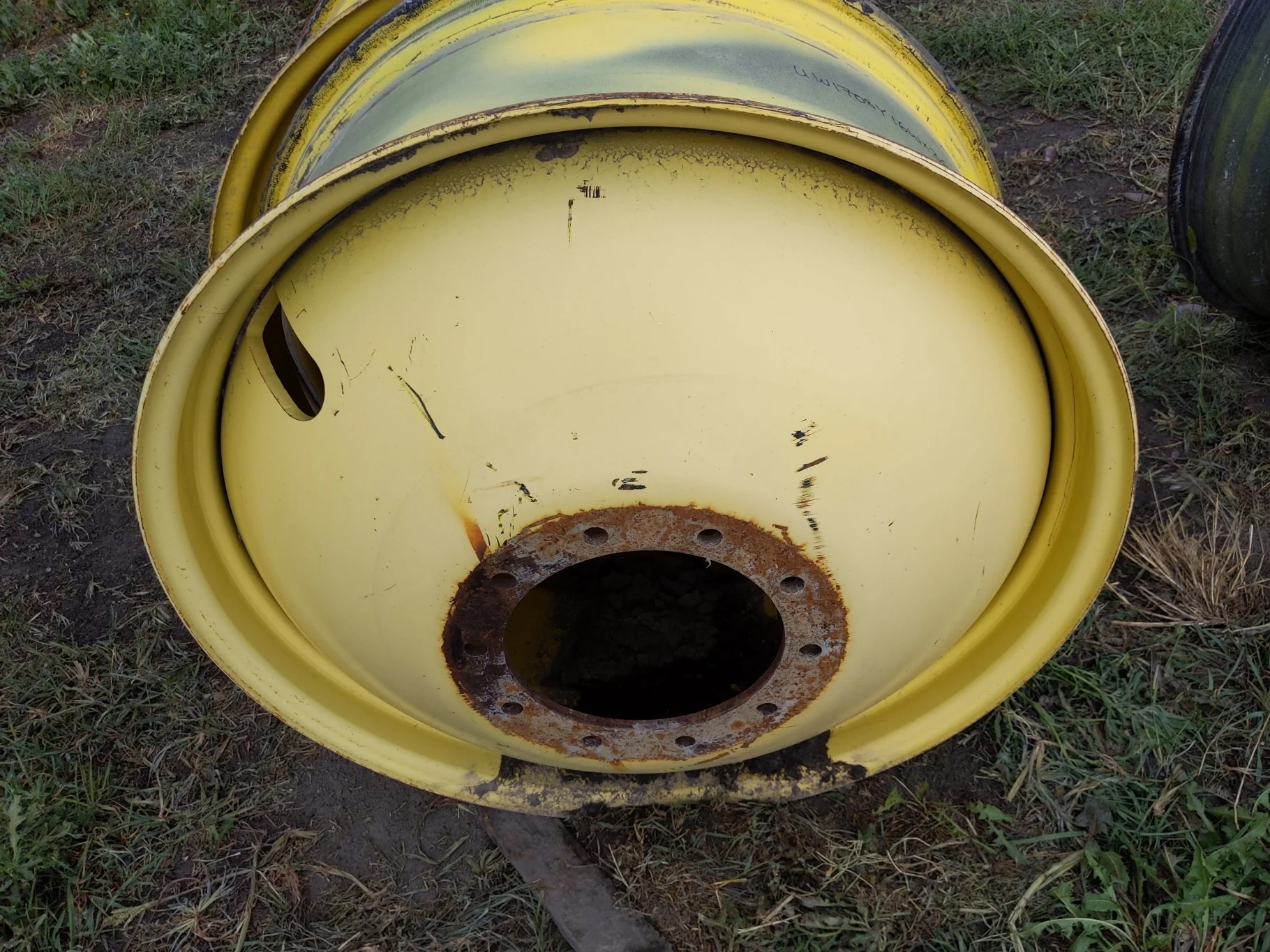 USED 16 X 38 10-13.187-11.07-12.4 (OUTSIDE) DOLLY DUAL YELLOW WHEEL