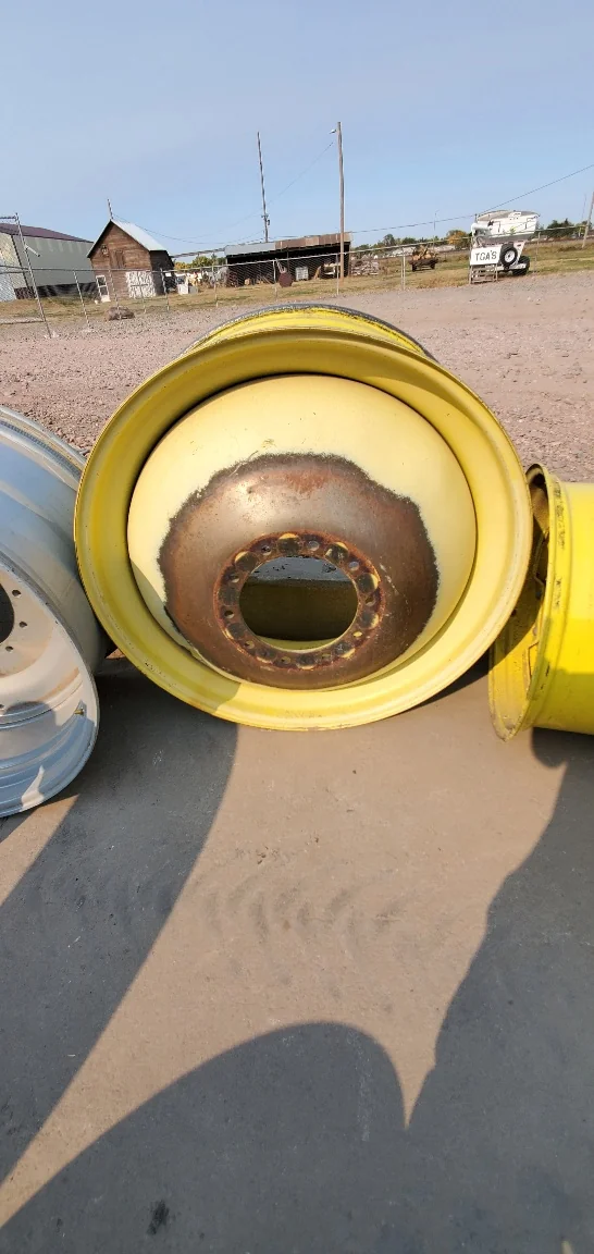 Used 16 X 42 John Deere 10 bolt (23mm) Dolly dual (10-13-11), Faded, Paint coming off, Rust image 2