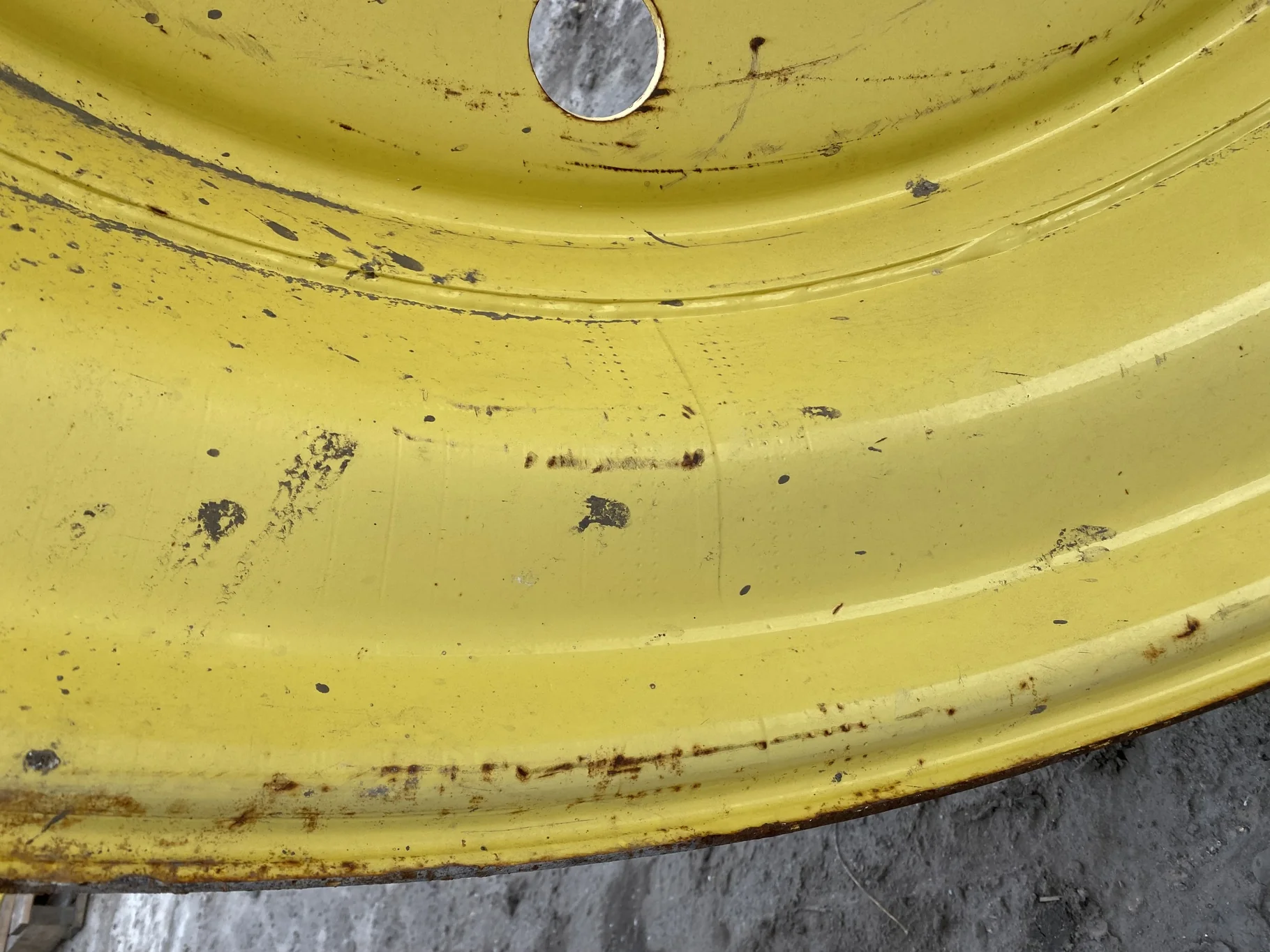 Used 16 X 46 JD yellow 10 dual wheel ( 10-13-11) Faded paint, rust, gashes/scratches, bent lip image 3
