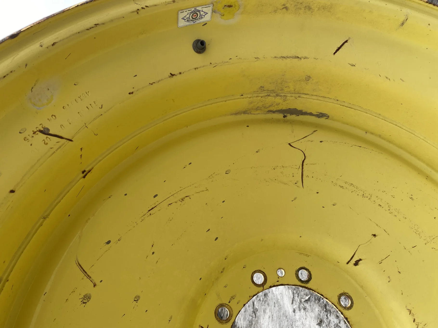 Used 16 X 46 JD yellow 10 dual wheel ( 10-13-11) Faded paint, rust, gashes/scratches, bent lip image 4