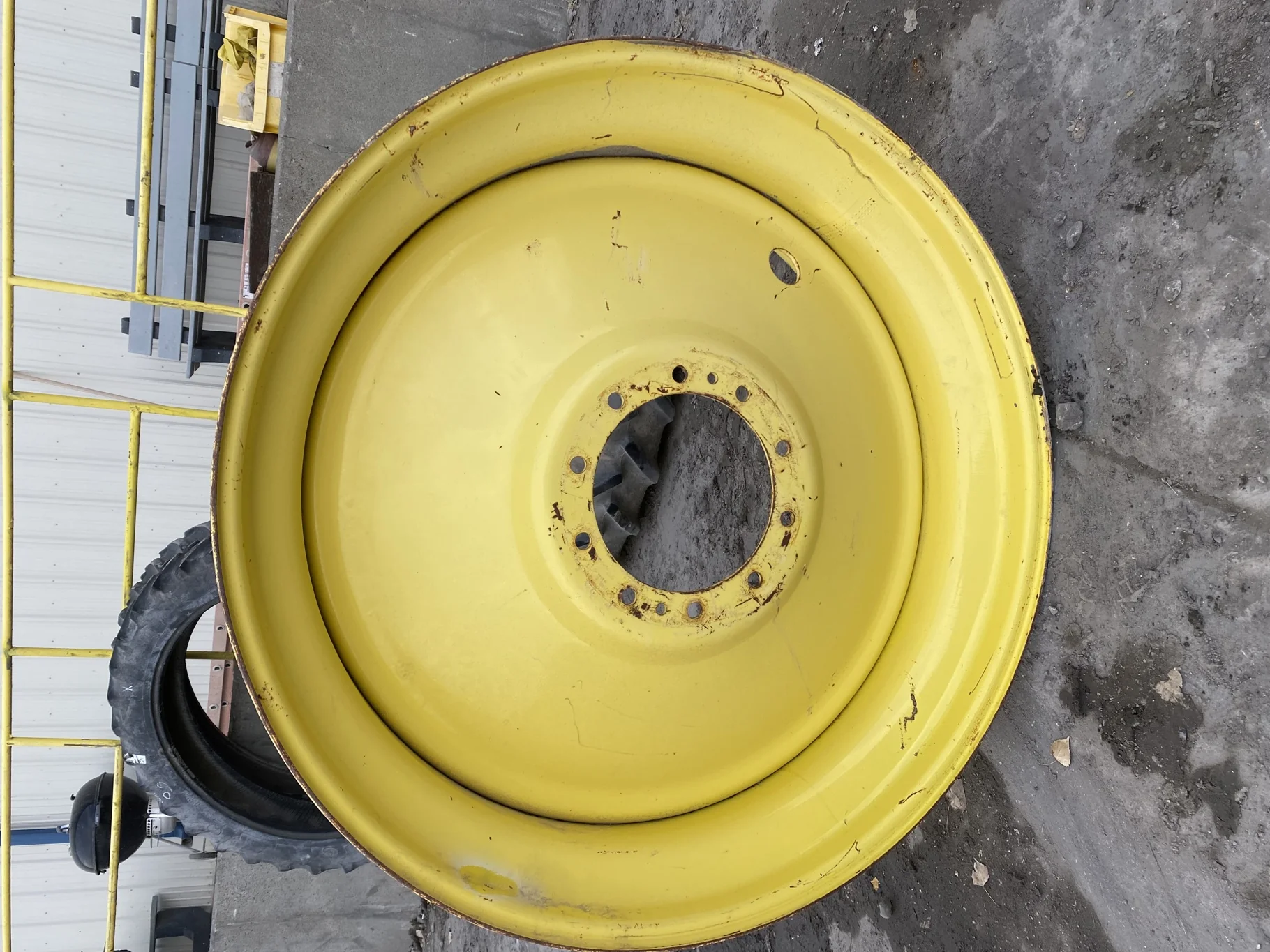 Used 16 X 46 JD yellow 10 dual wheel ( 10-13-11) Faded paint, rust, gashes/scratches, bent lip image 5