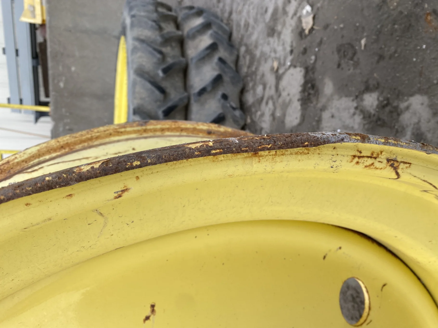 Used 16 X 46 JD yellow 10 dual wheel ( 10-13-11) Faded paint, rust, gashes/scratches, bent lip image 6