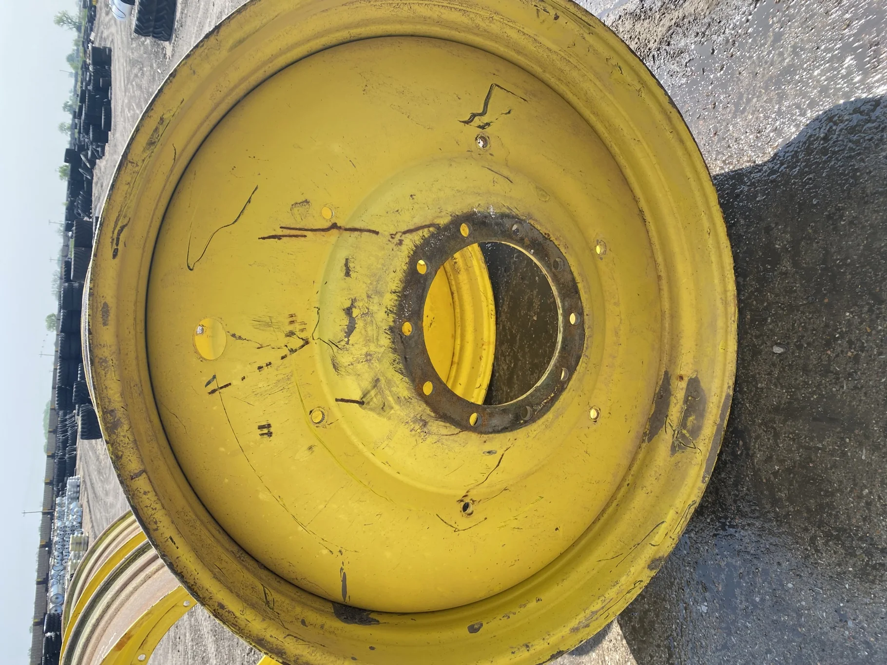 Used 16 X 46 JD yellow 10 dual wheel ( 10-13-11) Faded paint, rust, gashes/scratches, bent lip image 9