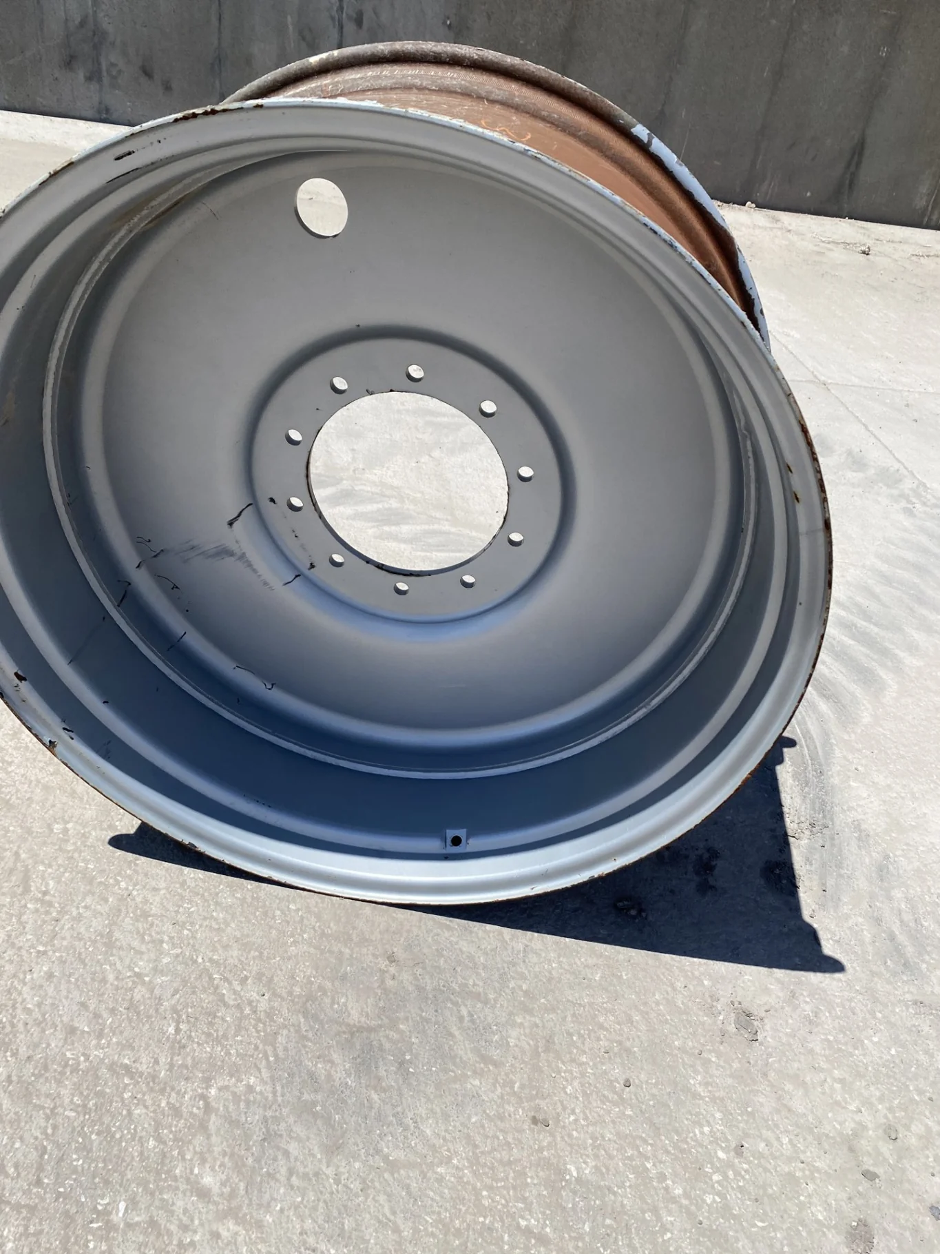 Used 18 X 38 (10-13-11) CIH Silver Wheel (Gashes; rust; Chipped paint)